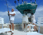 Roomy  boats rigged for tarpon fishing